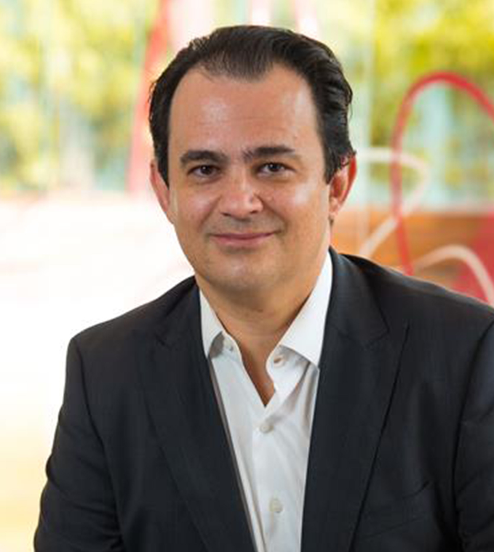 image of team in front of company building (for a roofing contractor)